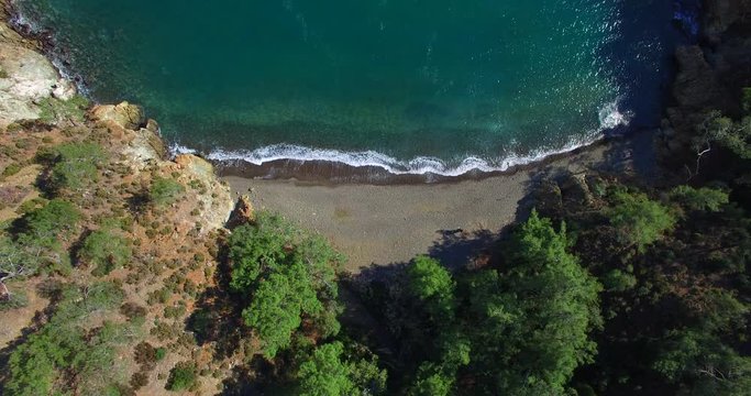 aerial view of sea and waves coming to beach summer time mediterranean sea coastline