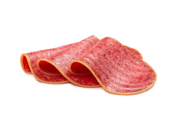 Salami slices isolated on white background.
