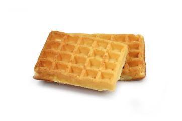Freshly baked belgian waffles isolated on white background.