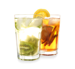 Glasses of tasty cold ice tea on white background