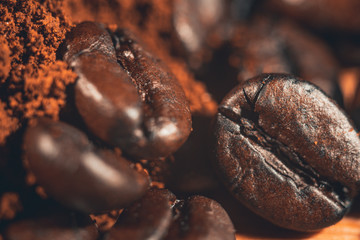 Coffee beans macro photography filtered in vintage style. Preparing coffee close up.