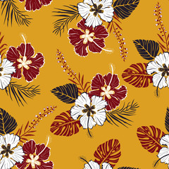 tropical flowers vector pattern on yellow background © Lana