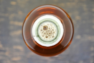 
beer bottle top view. abstraction and blur
