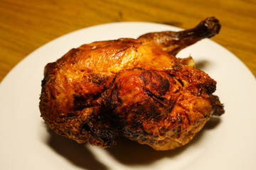 Chicken baked whole, close-up.