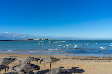 Sandy coast of the Mediterranean Sea within the city of Cadiz, Spain