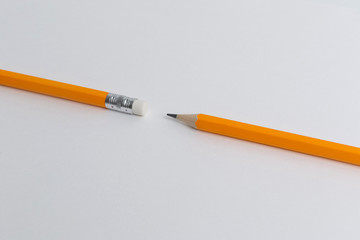 creativity concept with two side of pencil on paper texture.