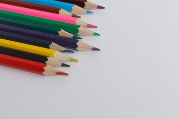Colored pencils isolated on white background