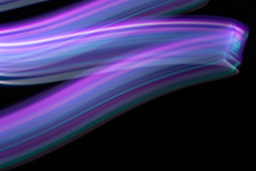 colorful neon light painting photography, long exposure, ripples and waves against on background