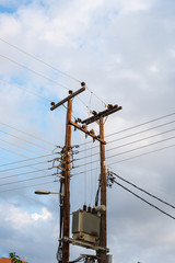 Old electriacal interchange on wooden poles.