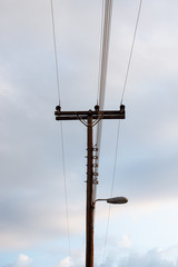 Electric wires wooden pole. Parallel lines.