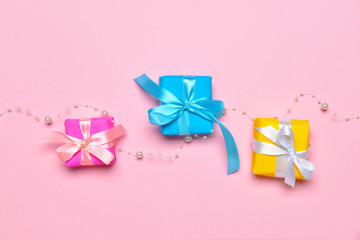 Birthday gifts on color background