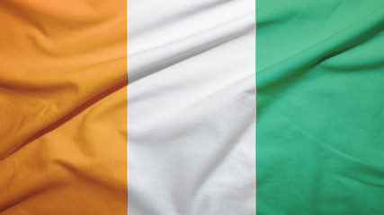 Obraz premium Cote d'Ivoire Ivory coast flag with fabric texture