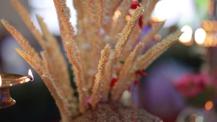 Wedding ceremony, traditional indian hindu marriage ritual with red flowers and attributes