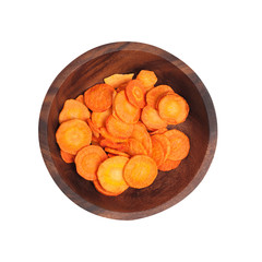 dried carrots in a brown wooden plate.