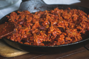 Tomato meal with beans, vegetables and vegan minced meat.