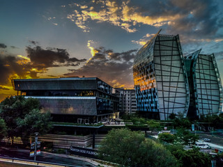 Johannesburg, South Africa - Jan 1 2020 : HDR photo of Sandton offices at sunset. Sandton in the financial hub of Johannesburg. - obrazy, fototapety, plakaty