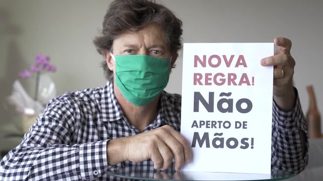 COVID-19. N&atilde;o aperte as m&atilde;os. Pare de apertar as m&atilde;os para evitar a propaga&ccedil;&atilde;o do coronav&iacute;rus. Conceito de distanciamento social. Foco no objeto, n&atilde;o no modelo. 