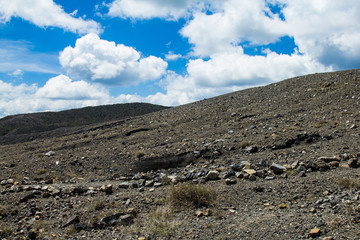 Mountain top with many clouds around