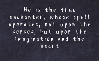 Chalk inscription of smart quote on black desk © iushakovsky