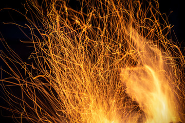 Warm, toasty, chilled out fire stock image with embers, flares, camping, good feels. 