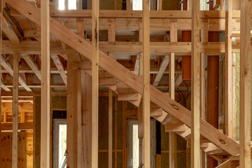 Construction of a new frame house. Wooden structures indoors