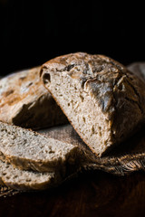 loaf of bread on wooden table