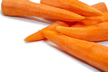 Peeled carrots on a white background.  Ingredients for salad.