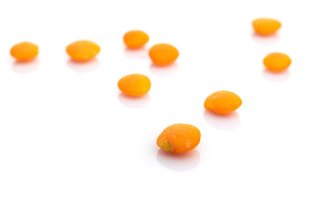Cereal lentil organic seeds background. Pile healthy red raw lentils nutrition food. Healthy vegetarian superfood concept with antioxidant, omega-3, protein, mineral nutrients.