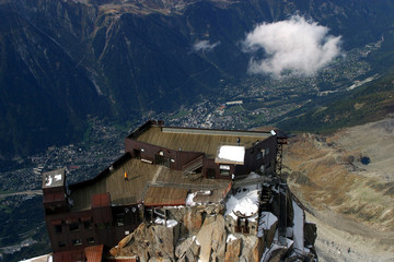 Fototapeta na wymiar Top of the Mount Aiguille Du Midi and Chamonix Village in French Alps, France.