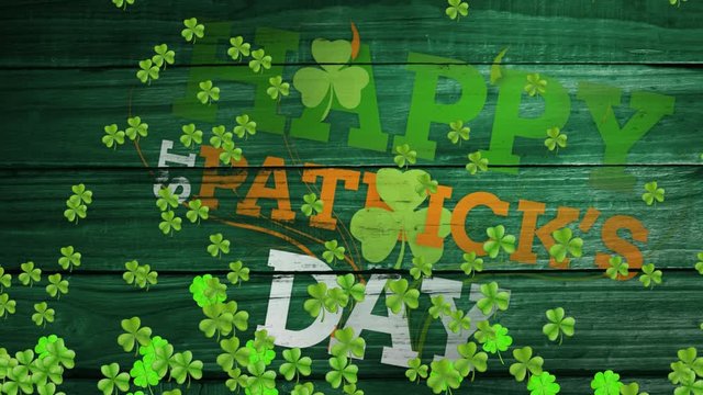 Word St. Patricks day with animation of green clovers moving