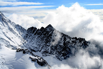 Chamonix Mountains and cloudscape in French Alps, France. This picture was taken from the Mont Blanc.