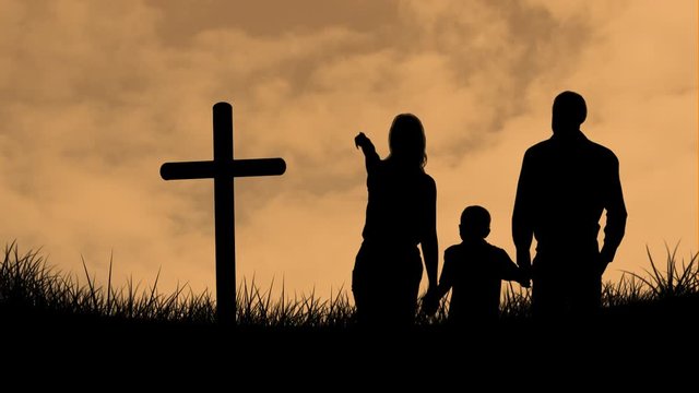 Animation of silhouette of Christian cross and family with one child over orange clouds