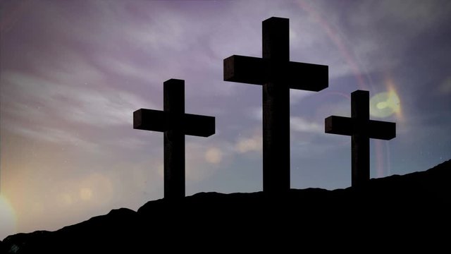 Animation of silhouette of three Christian crosses over moon and sun