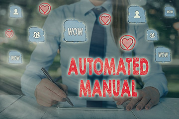 Writing note showing Automated Manual. Business concept for as trigger shift and it can switch...
