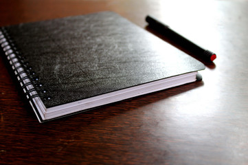 notebook and pen