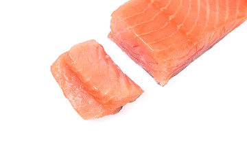 Sliced salmon fillet isolated on white background.