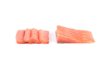 Sliced salmon fillet isolated on white background.