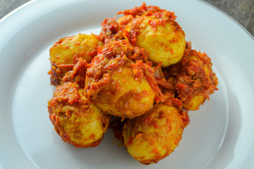 Telur balado (spicy eggs). indonesian food made from eggs, chili, tomatoes, garlic and other and other ingredients