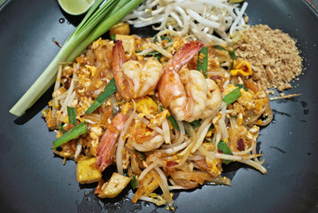 Classic Pad Thai (Phad Thai) is traditional cuisine in Thailand ,is stir-fried rice noodle dish with shrimps ,tofu ,scrambled egg ,bean sprouts seasoning with pad thai sauce