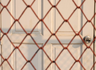 Fototapeta premium lock the door and fence before go outside to keep your assets safe from a thief.