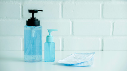 Coronavirus prevention alcohol gel clean hand sanitizer and medical surgical masks hygiene corona virus protection