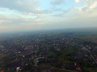 Obraz premium Aerial view of the saburb landscape (drone image). Near Kiev. Early morning. Sunrise time.