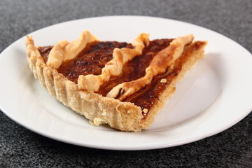 Shoofly Tart with Golden Syrup Filling on Granite Surface