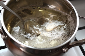 Boiling and Mixing Cider in Pan on Gas Stove. Making Cider Pie Series.