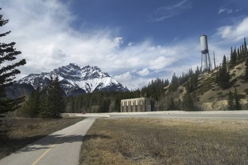 Historic Banff Legacy Cycling Trail by Trans-Canada Highway and Snowy Cascade Mountain Peak, Banff National Park Canadian Rockies