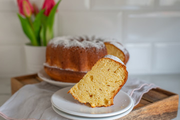 freshly baked curd cheese gugelhupf with powdered sugar