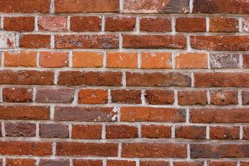 embossed brick red wall texture background monolith