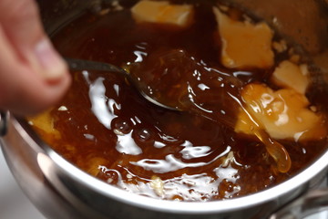 Melting ingredients of filling mixture. Making Cider Pie Series.