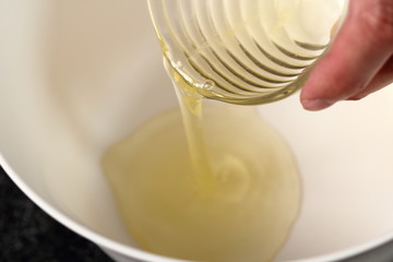 Pouring egg whites into bowl. Making Cider Pie Series.