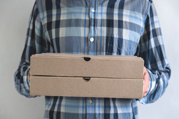 man holding a pizza box,delivery concept